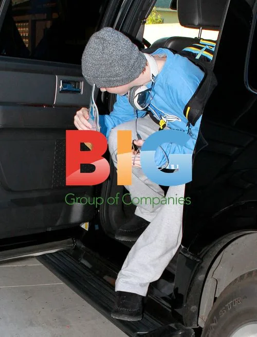 Dina Lohan and kids arrive at LAX to visit Lindsay
