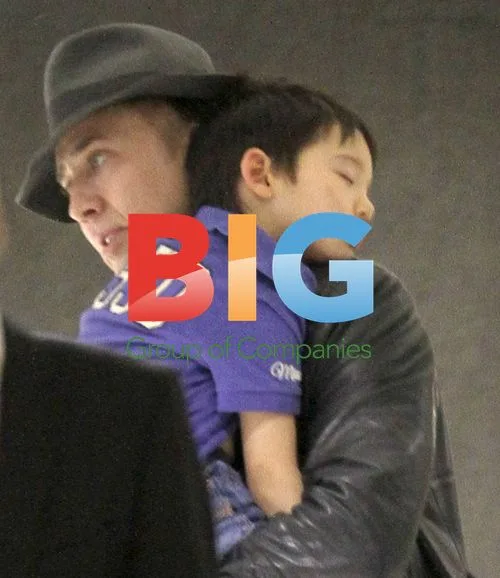Nicolas Cage Arrives at LAX with Son