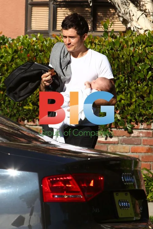 Miranda Kerr and Orlando Bloom with Baby Flynn