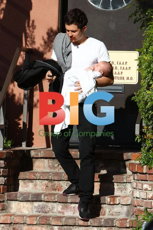 Miranda Kerr and Orlando Bloom with baby Flynn