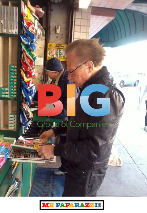 Larry King buys magazines in Beverly Hills