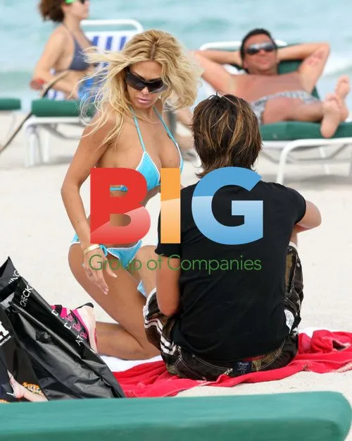 Shauna Sand frolics with husband in Miami Beach