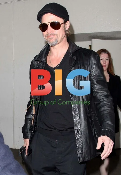 Brad Pitt Arrives at LAX