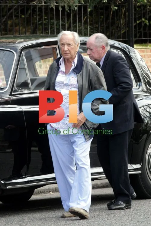 Michael Winner in Vintage Rolls Royce