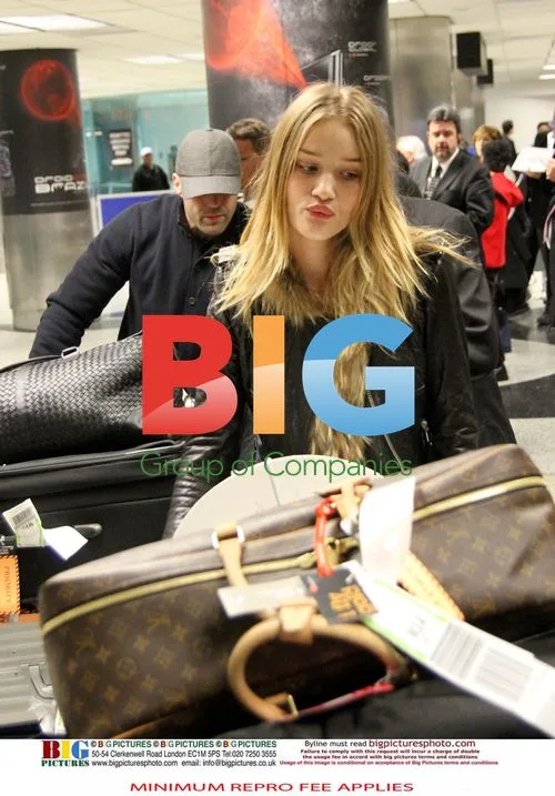 Jason Statham and Rosie Huntington-Whiteley at Airport