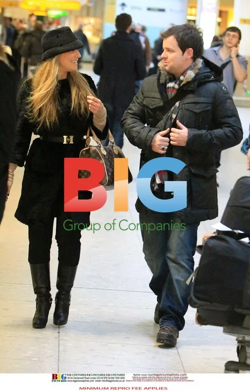 Declan Donnelly and Georgie Thompson arrive at Heathrow