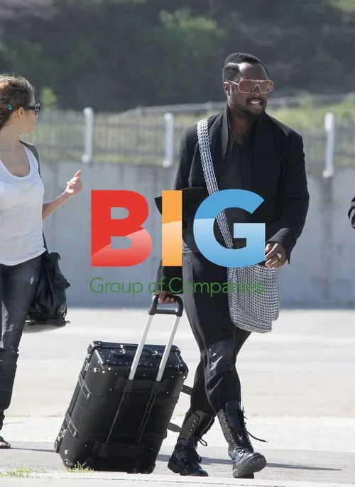 will.i.am catches helicopter in St Barth