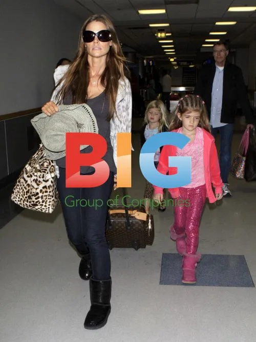 Denise Richards & Daughters Return to LAX
