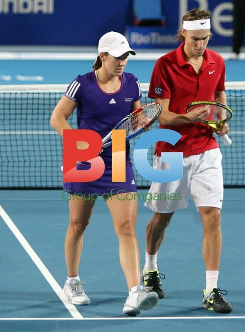 Justine Henin and Ruben Bemelmans at tennis