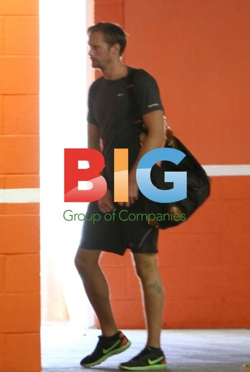 Alexander Skarsgard waits for elevator after workout