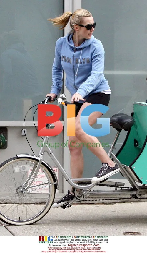 Kate Winslet Arrives on Tricycle with Kids