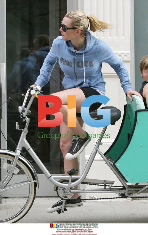 Kate Winslet Arrives on Tricycle with Kids