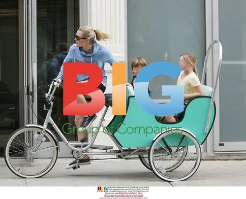 Kate Winslet Arrives on Tricycle with Kids