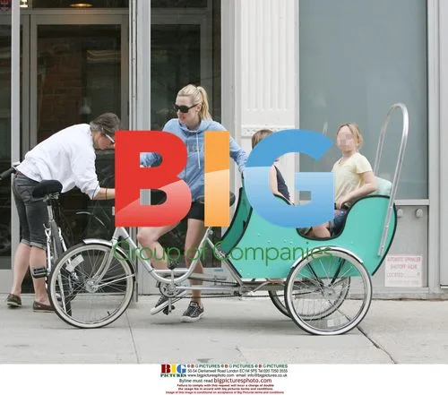 Kate Winslet Arrives on Tricycle