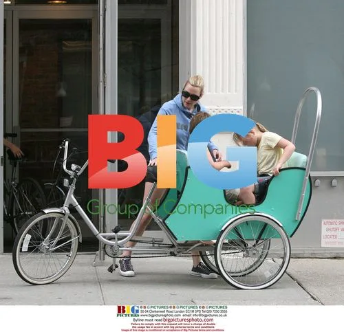 Kate Winslet Arrives Home on Tricycle
