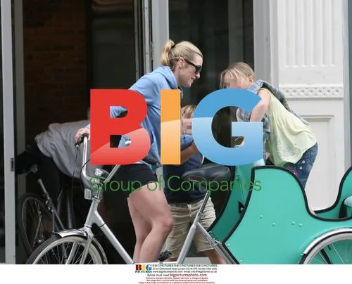 Kate Winslet Arrives on Tricycle with Kids