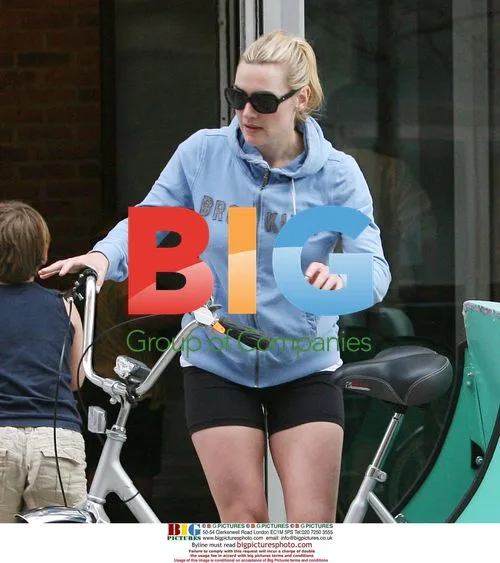 Kate Winslet Arrives on Tricycle with Kids