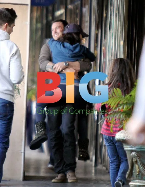 Brian Austin Green carries Megan Fox