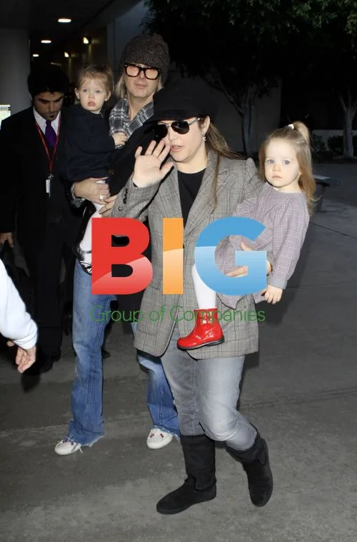 Lisa Marie Presley with family at LAX