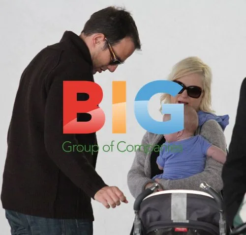 Will Arnett and Amy Poehler with son Abel at LAX