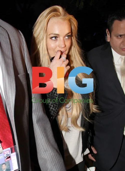 Lindsay Lohan Leaves Laker Game