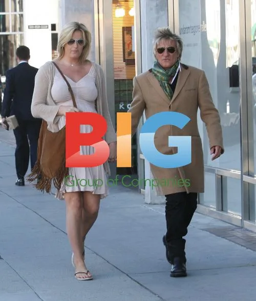 Pregnant Penny Lancaster and Rod Stewart