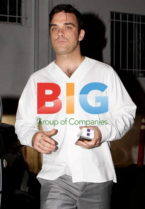 Robbie Williams Spotted with Cigarettes