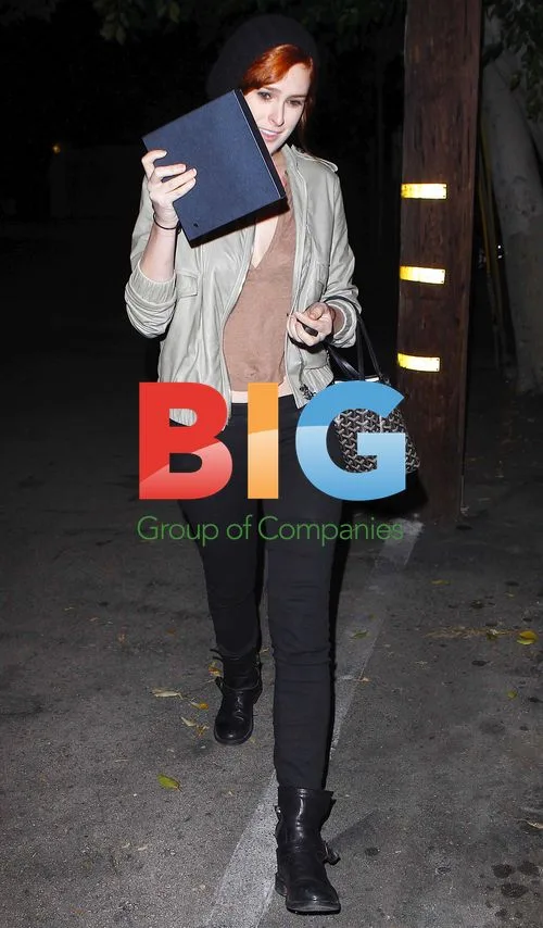 Rumer Willis leaves hair salon with red hair