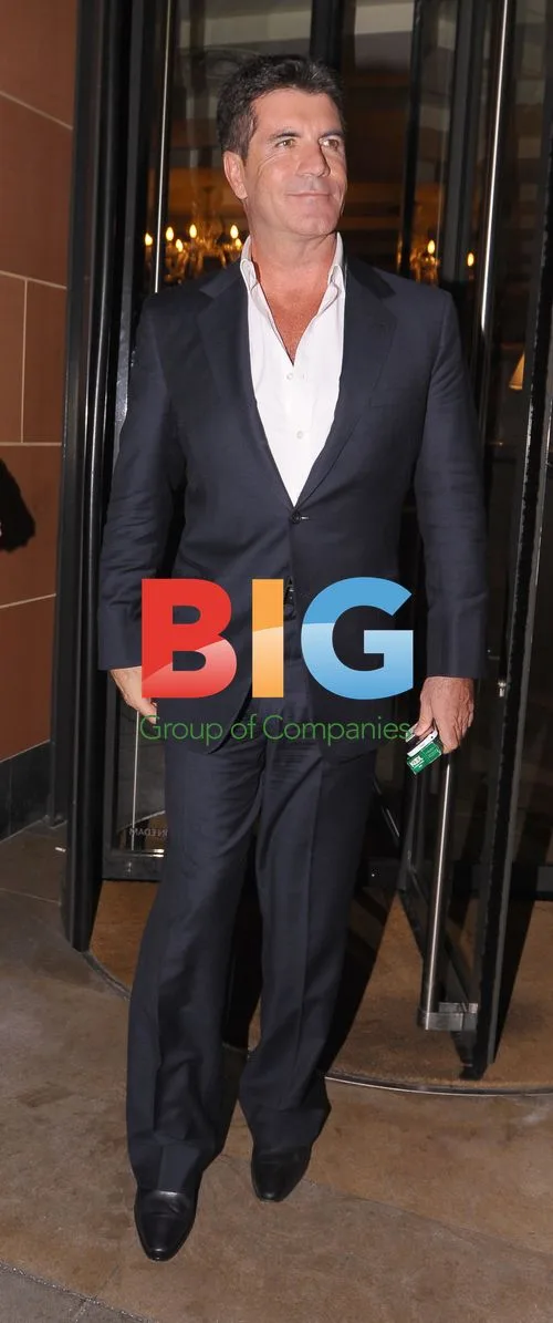 Simon Cowell & Mezhgan Hussainy at Ciprianis
