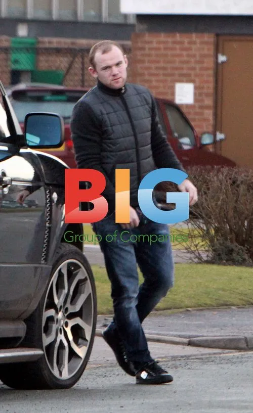 Wayne Rooney and Coleen Rooney Leaving Play Centre