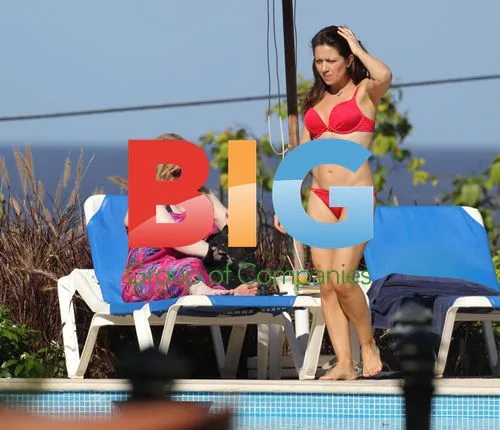 Clare Nasir in Red Bikini on Caribbean Vacation