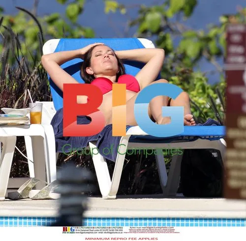 Clare Nasir in Red Bikini on Caribbean Beach