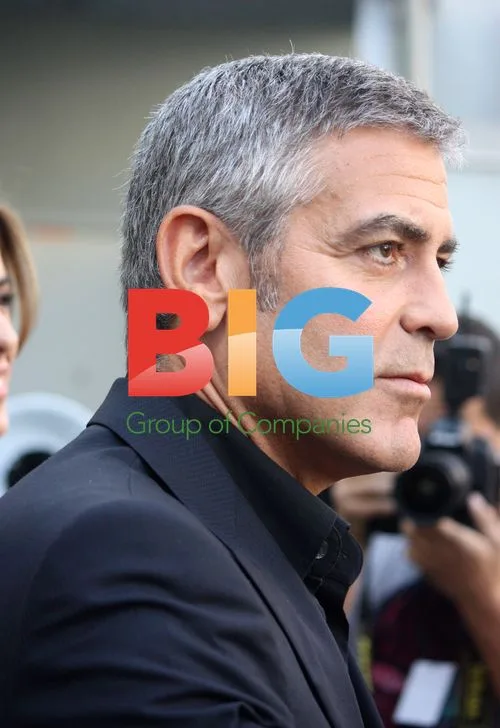 George Clooney and Elisabetta Canalis at Armani Fashion Show