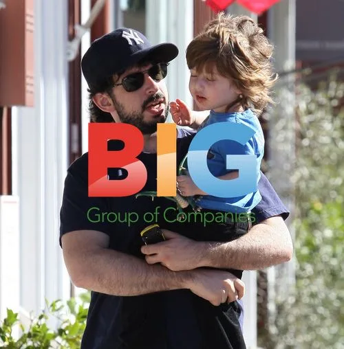Jordan Bratman and son Max take walk