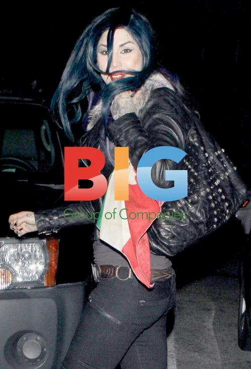 Kat Von D Leaving Tattoo Shop with Italian Flag