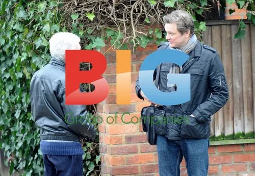 Colin Firth Talking to Friend in London