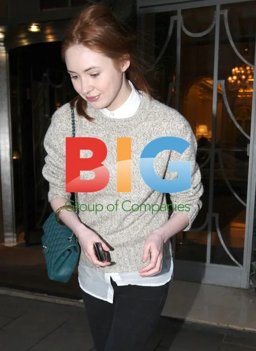 Karen Gillan signs autograph for fan in London