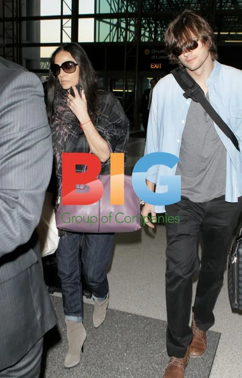 Kutcher, Moore and Scout at LAX