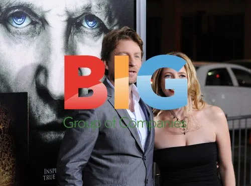 Director Mikael Hafstrom and wife Kelly at The Rite premiere