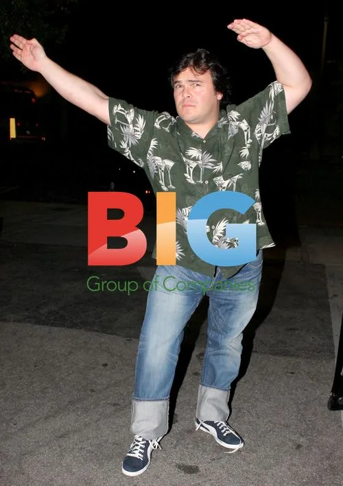 Jack Black flexing muscles with Jeffrey Katzenberg