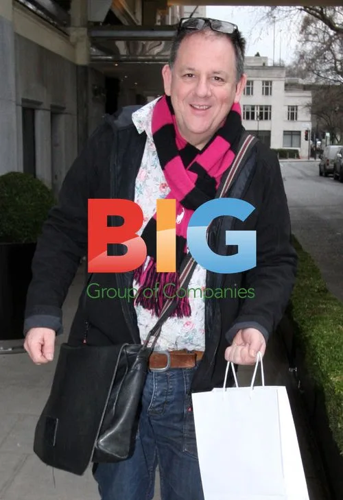 Fashion expert John Scott leaves London hotel