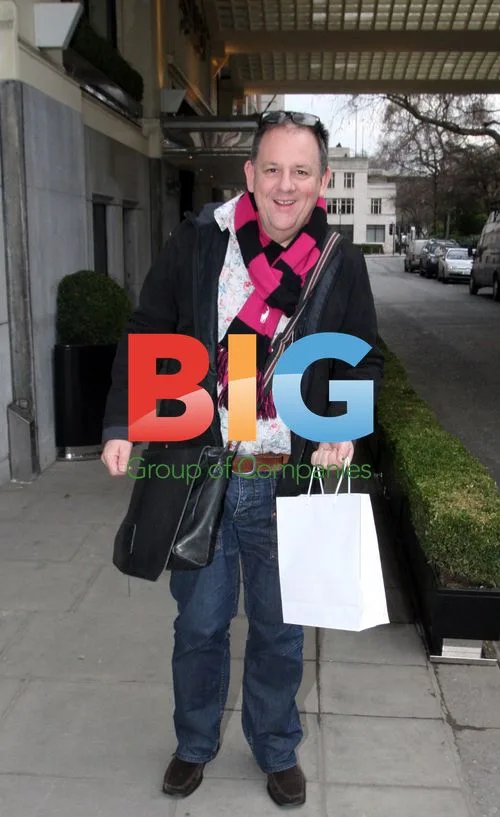 Fashion Guru John Scott Leaves London Hotel