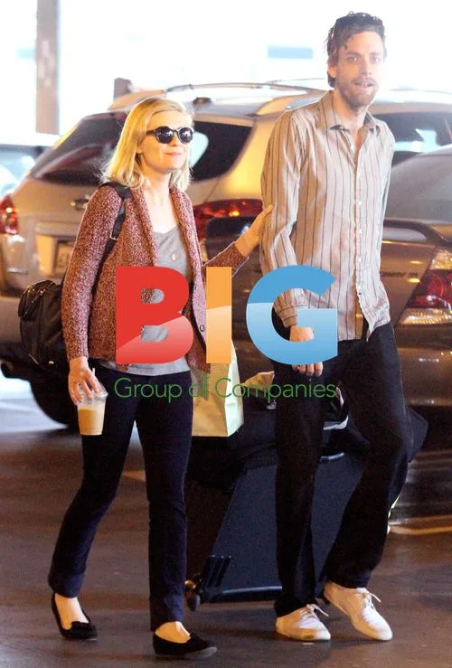 Kirsten Dunst with boyfriend at LAX