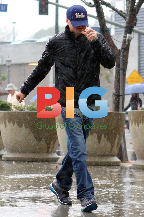 Leonardo DiCaprio Braves Rain in LA