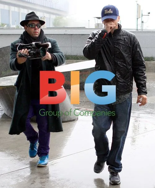 Leonardo DiCaprio Braves Rain in LA