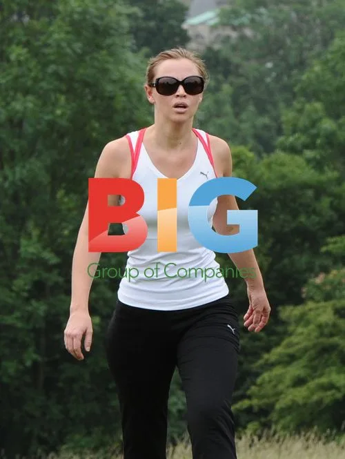 Kimberly Walsh Running with Trainer