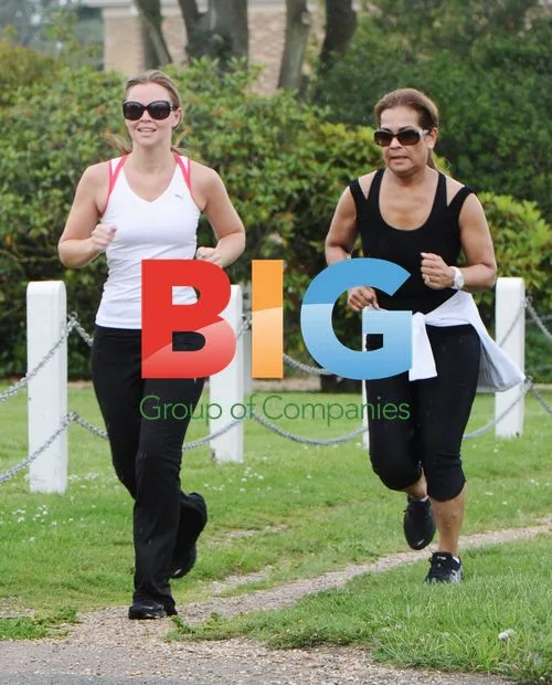Kimberly Walsh Running With Trainer