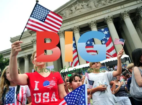Parade Watchers Wave Flags in D.C.