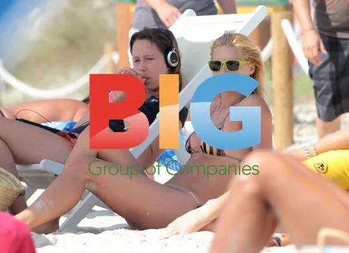 Michelle Hunziker at the Beach