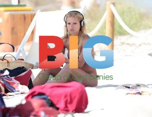 Michelle Hunziker at the Beach in Spain